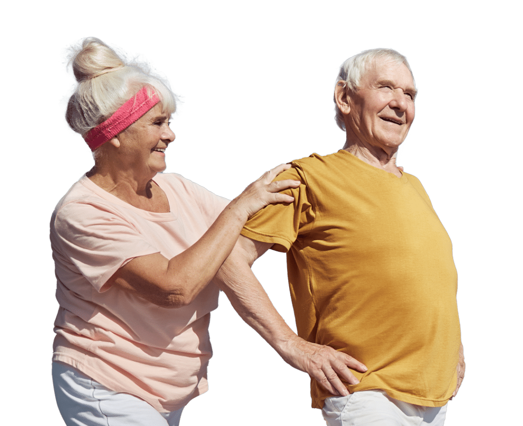 pleased-male-pensioner-doing-standing-shoulder-stretch-assisted-by-joyous-senior-caucasian-lady