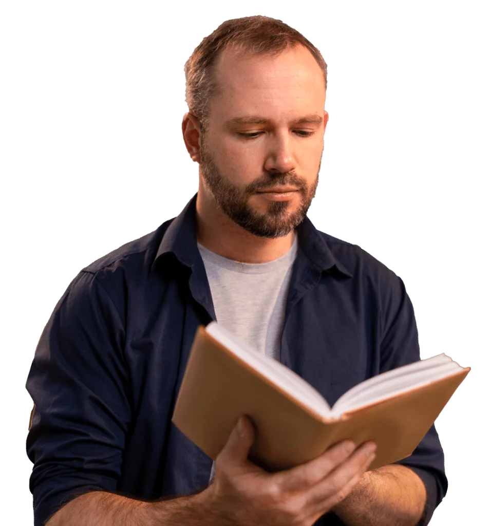 OPT_front-view-man-reading-indoors